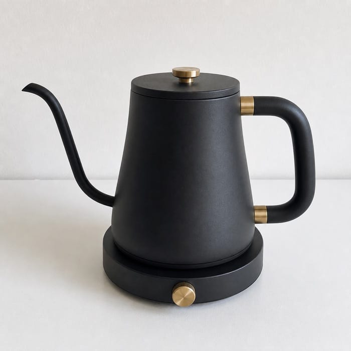 Plain phone photo of the kettle on a white surface